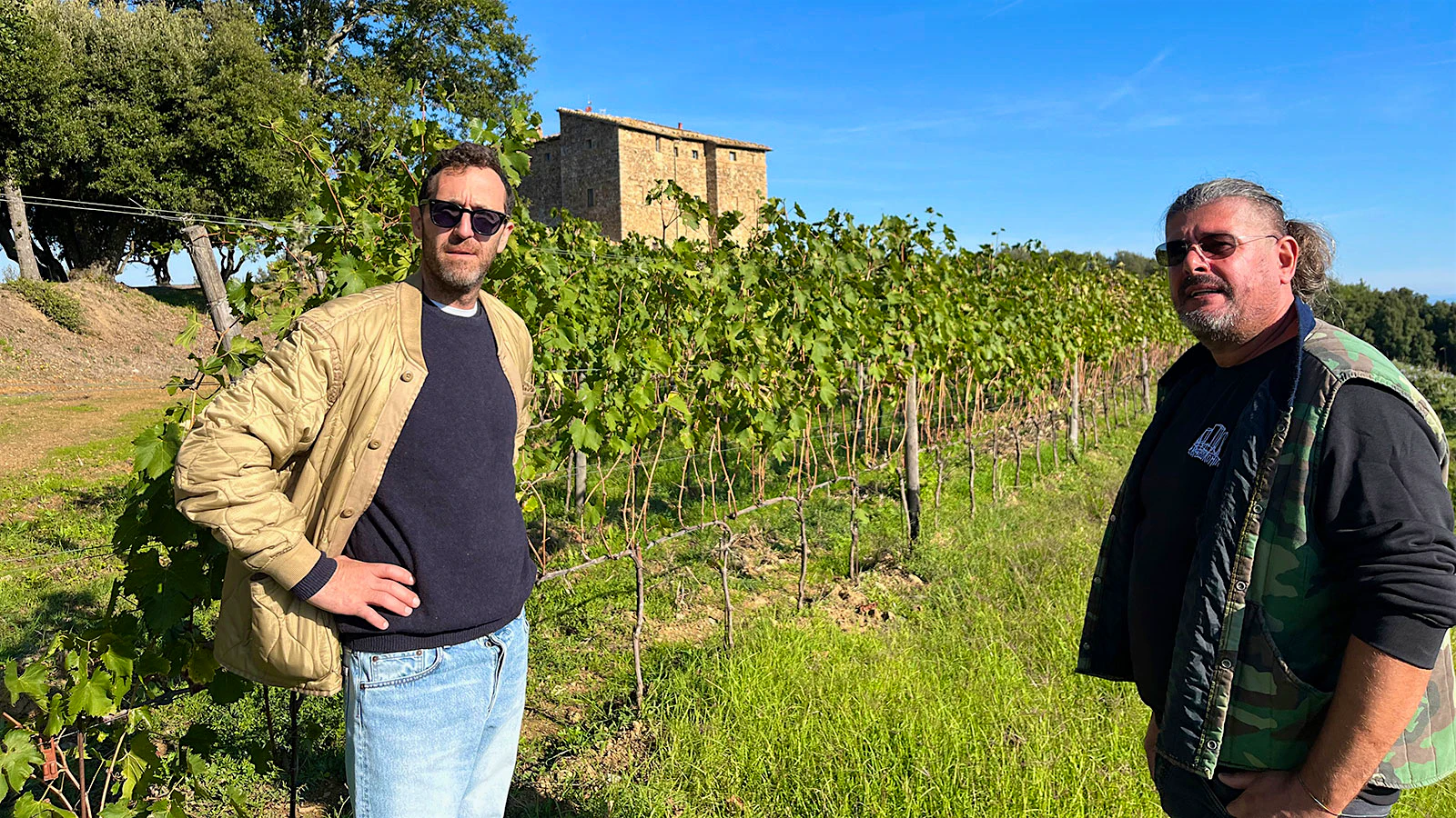 Filippo Chia (left) with cellar master and vineyard manager Stefano Martini in front of Castello Romitorio
